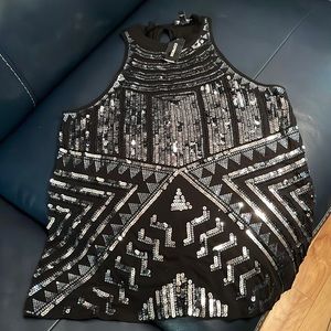 Black w/silver sequin top, looks with white jeans or shorts